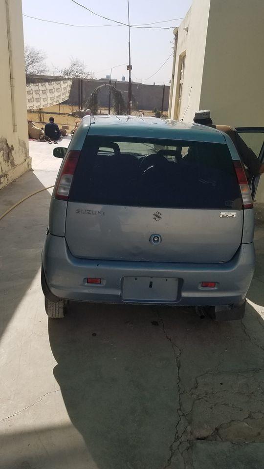 کی-سوزکی-ده-نیمروز-کاټ-لږ-کورنی-چليدلې-دی-غټ-ماشين-دی-ګیر-ده