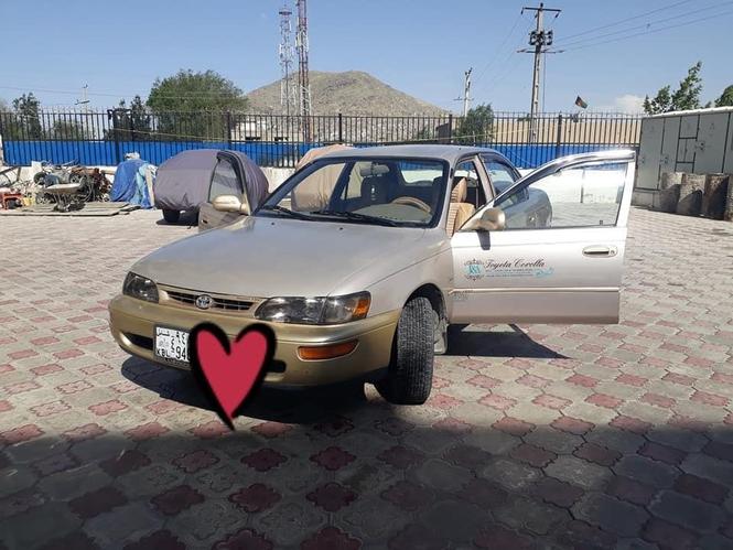 فروش عاجل موتر کرولایی کانادایی ۹۷ رنگ صلایی 0786737692