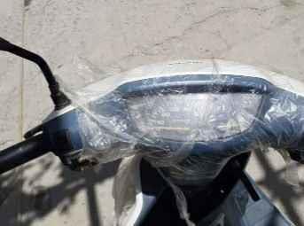 ‏‏‏‏‏یک عرداه موتر سیگل چاپینی رنگ در عکس معلوم میشه‏